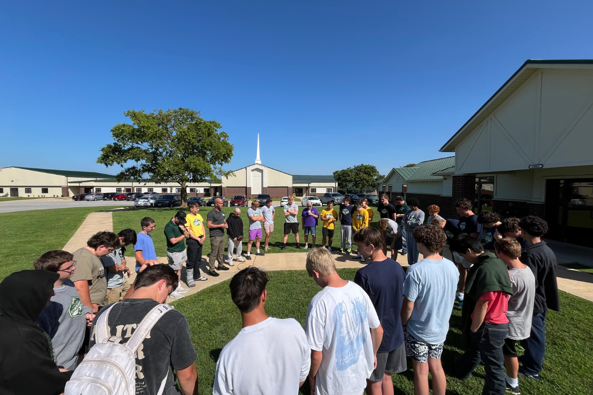 campus prayer circle students on teen challenge campus